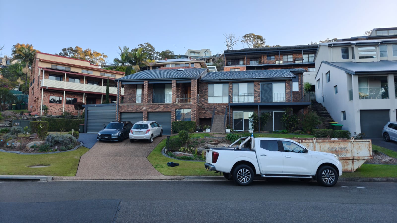 Exterior of home including full roof respray