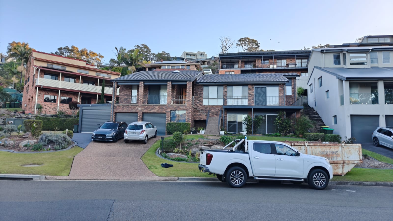 Exterior of home including full roof respray